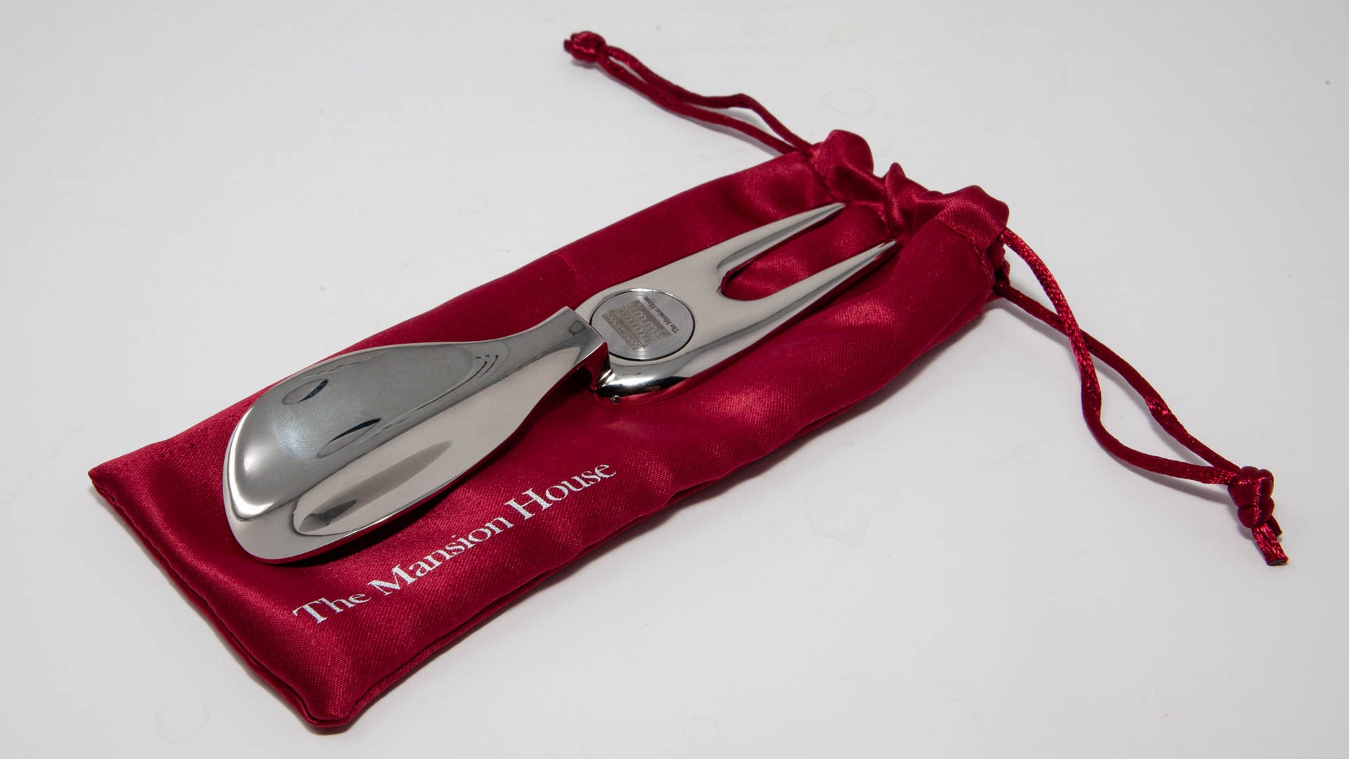 Golfer's Shoehorn and Ball Marker