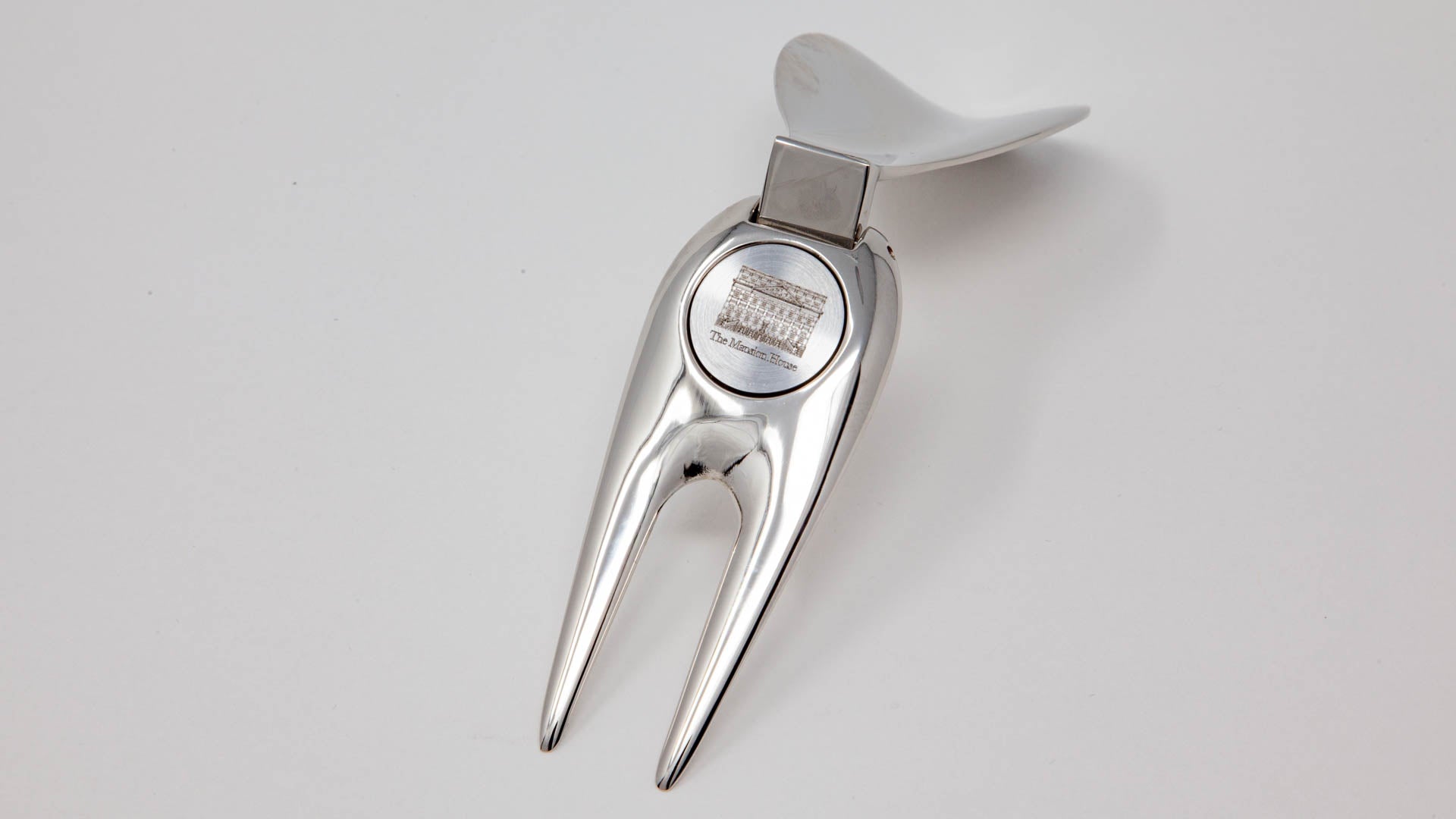 Golfer's Shoehorn and Ball Marker